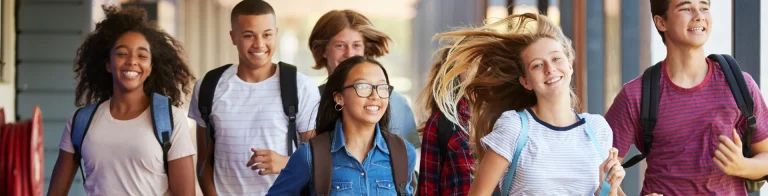 A group of happy students at school